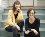 two women on steps