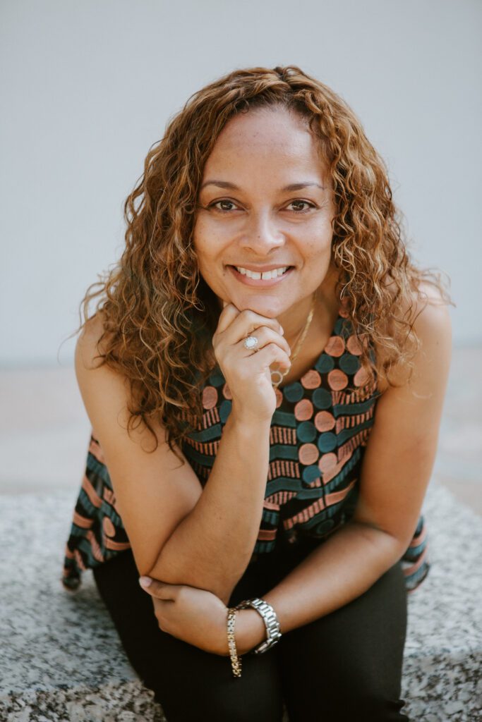 woman looking at camera smiling