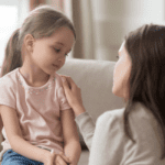 mother talking to daughter